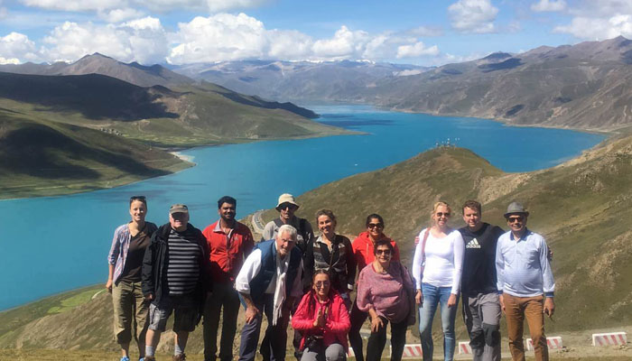 Senior tourists Yamdrok Lake tour