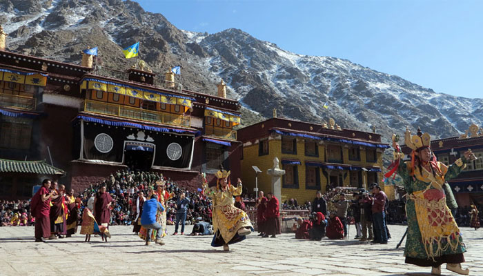 Watch the Cham Dance in Tsurphu Monastery