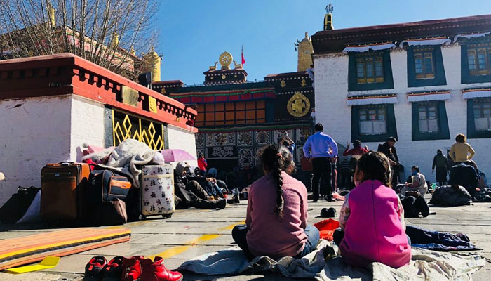 Tibetan pilgrims  in front of Jokhang Temple