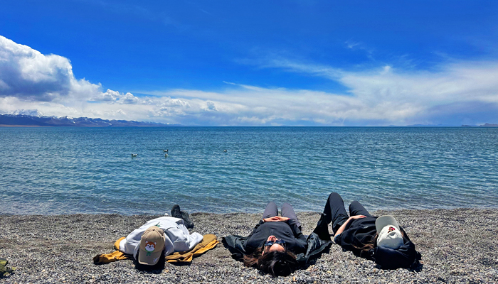 Guests reflecting peacefully at Tashi Dor Island, Namtso Lake