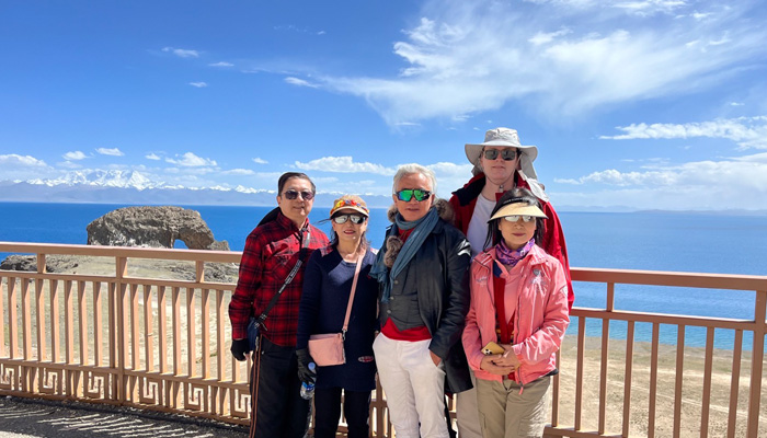 Guests visiting Namtso Lake during small group tour