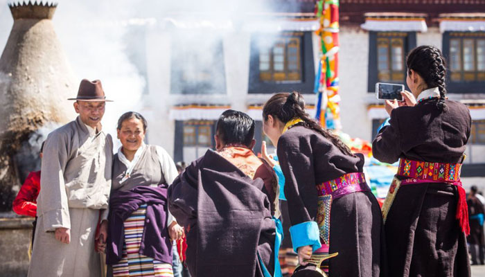 Tibetans in Traditional Costumes