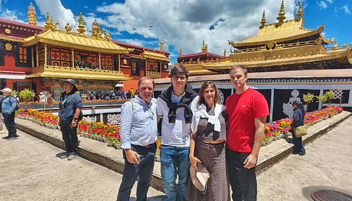 Family of four visiting Jokhang Temple during a private Tibet tour