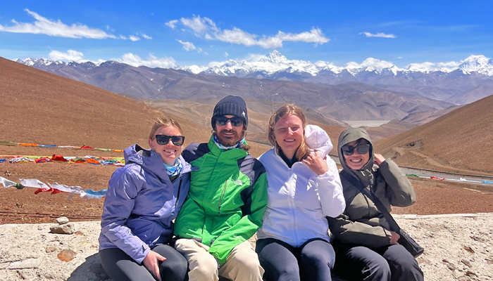 Small group travelers at Gawula Pass in Tibet