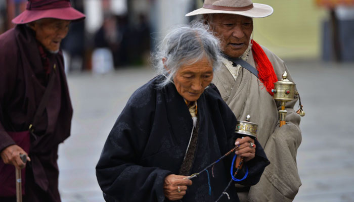 rotate a prayer wheel