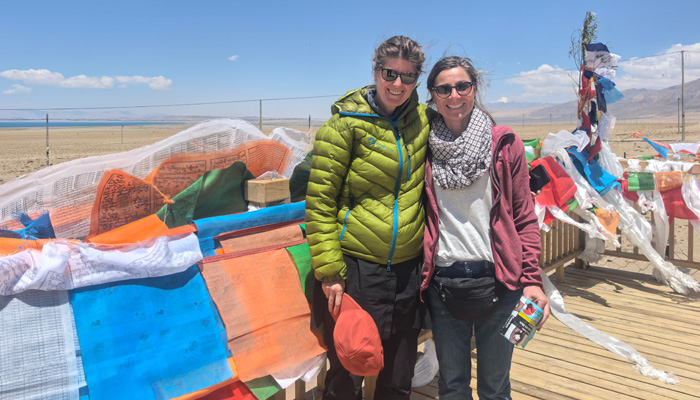 colorful prayer flags fluttering druing travel in Tibet