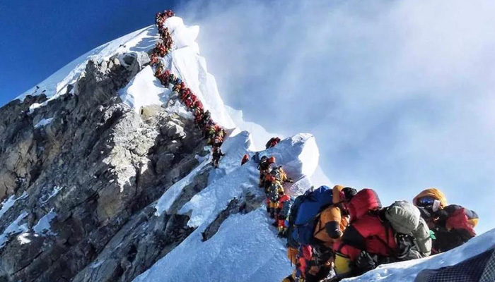 climbing Mount Everest