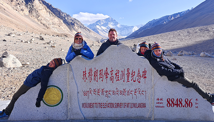 Family travelers visiting Everest during a Tibet family tour