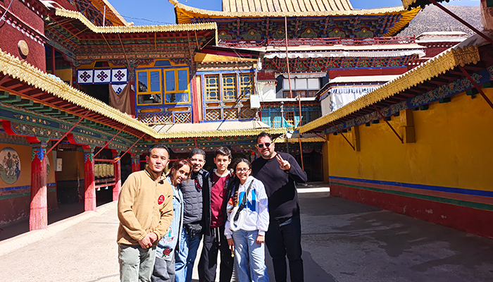 Family travelers exploring Tibet with a local Tibetan guide