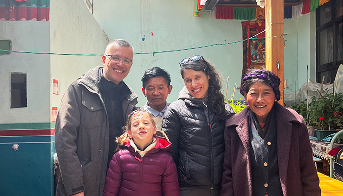 Family travelers visiting a local Tibetan family home